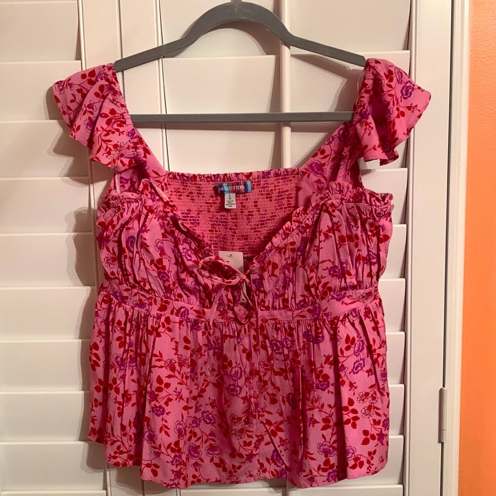 urban outfitters top fitted around the bust then flows out, new with tags